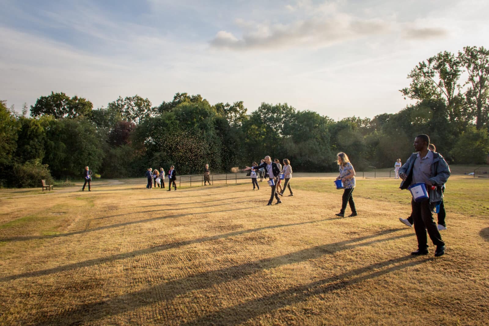 Staff and other volunteers head out with Kim Wilde onto the lawn at Mount Vernon to scatter native wildflower seeds, led by Nature Recovery Ranger Karen MacKelvie. Credit: Vicki Brown / CSH September 2021. Attribution 4.0 International (CC BY 4.0).