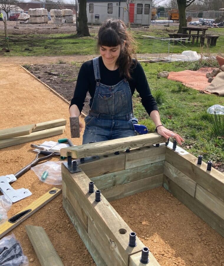 Nature Recovery Ranger builds a raised bed at Southmead Hospital, Bristol